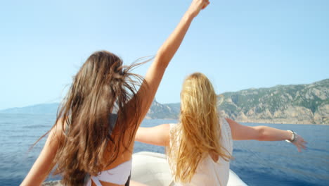 two friends enjoying a boat trip