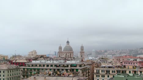 historical buildings of genoa on moody cloudy day, drone cinematic ascend view