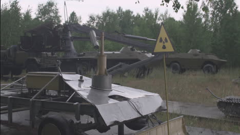 Shot of the abandoned radioactive vehicles near Pripyat in the exclusion zone, near Chernobyl Powerplant, Ukraine.