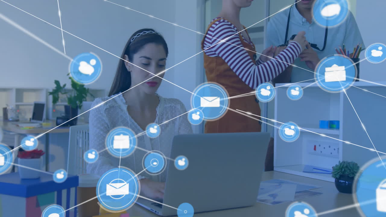 Female professional typing on laptop in business office, displaying floating cloud envelope icons