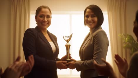 celebrating achievement: two professionals sharing a moment of triumph as they exchange a prestigious award in an inspiring ceremony setting