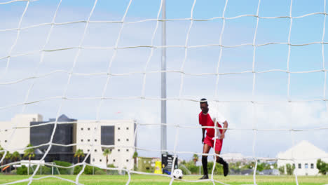 Goalkeeper-defending-a-goal-in-the-field