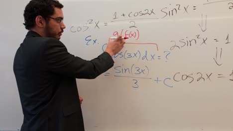 mathematics teacher solving a trigonometric integral