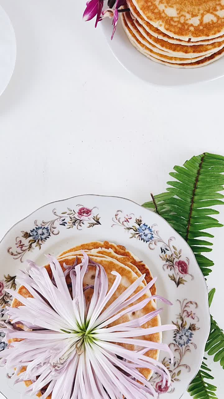 Elegant Stacked Pancakes with Flowers