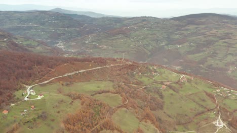 Aerial-flyover-of-the-rural-town-of-Tutin-in-southwestern-Serbia-during-the-fall