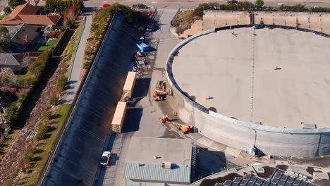 construction workers working at the bay street reservoir during the wall replacement project in santa cruz, california