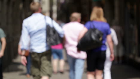 busy street with anonymous walking people