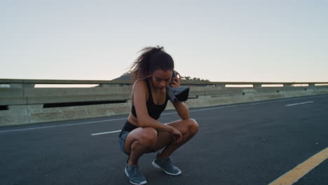 Fitness,-woman-and-sweating-on-break-from-running