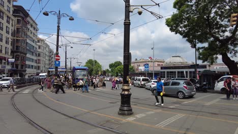 istanbul city street scene with tram and people