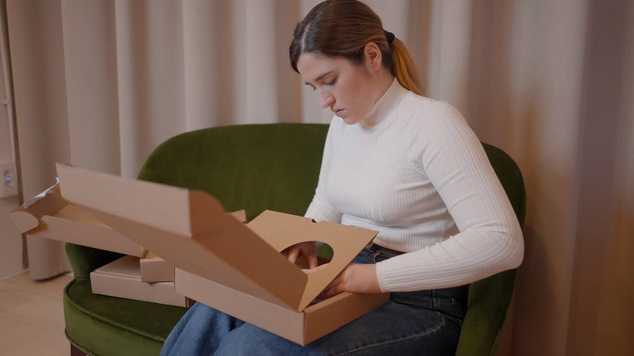 Woman Unboxing Multiple Packages at Home