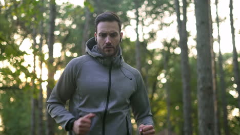 man running in a forest