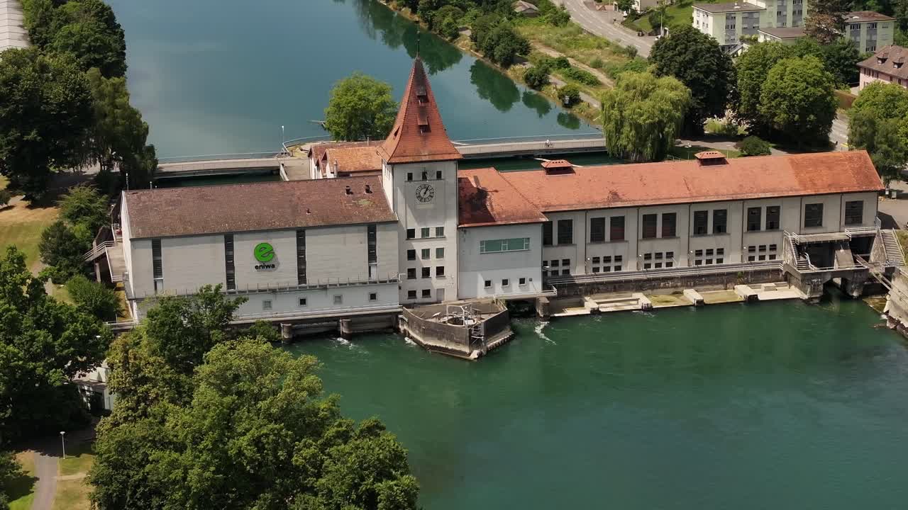aerial view of riverside building and clock tower in aarau switzerland