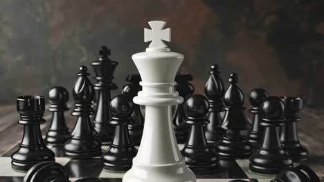 a white chess piece standing out from the crowd of black and white chess pieces