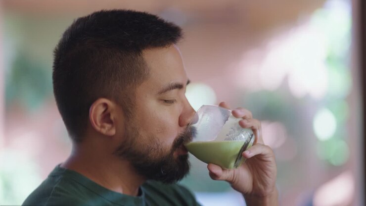 Man Drinking Green Tea