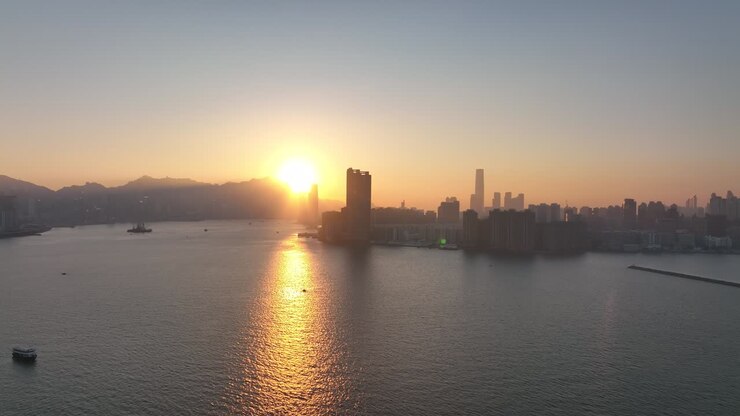Imagens aéreas 4K da cidade de Hong Kong ao pôr do sol