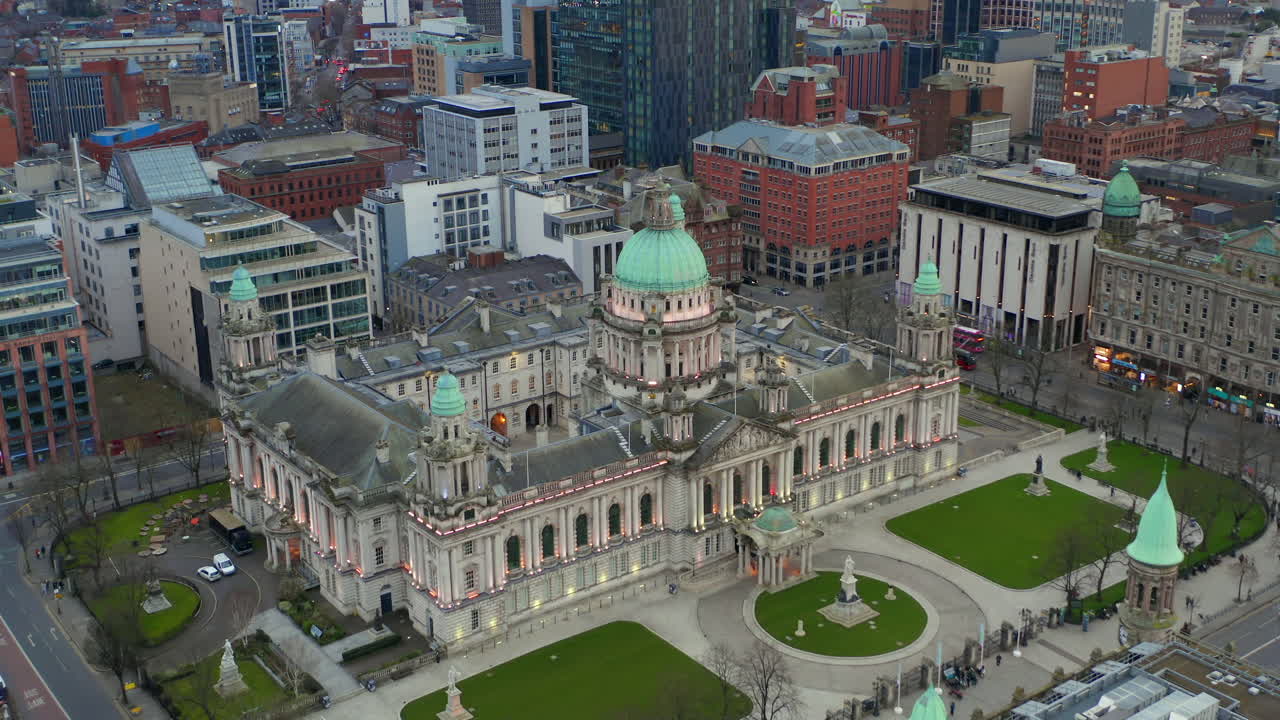 Establishing aerial orbit of Belfast town hall on a peaceful evening