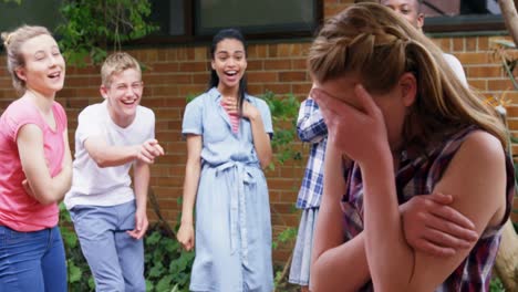 school friends bullying a sad girl in school premise 4k