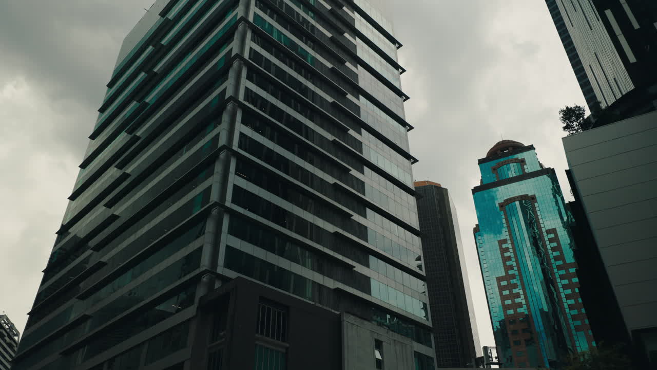 Modern City Skyscrapers Under Cloudy Sky