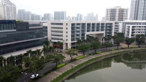 drone dolly towards luxury condos rises to reveal ho chi minh city skyline vietnam