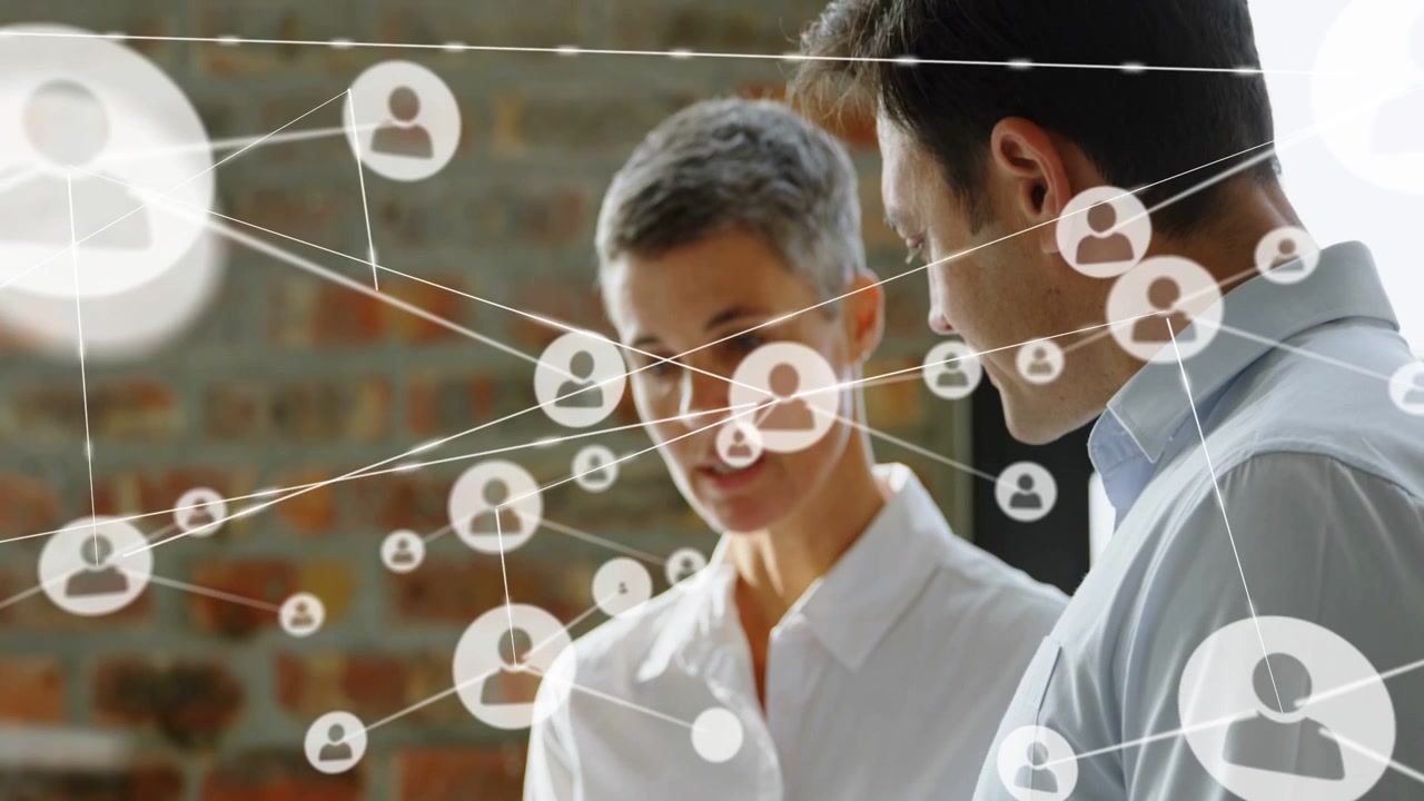 Team holding car model while woman tapping phone starting network overlay across pair for business