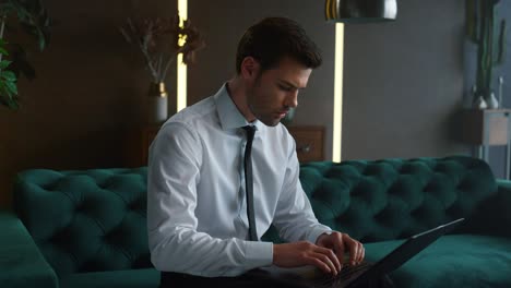 business man talking online in office. manager using laptop with green screen