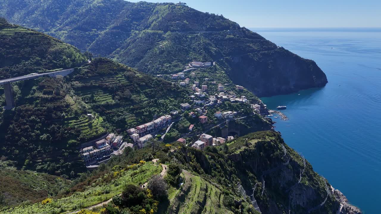 Drone footage of a small village on the coast of Cinque Terre in Italy.