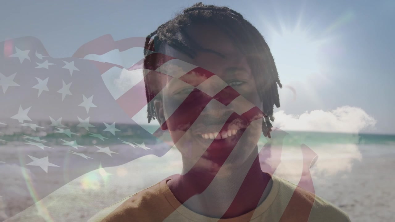 ビーチにいる友人グループの上空で揺れるアメリカ国旗のアニメーション