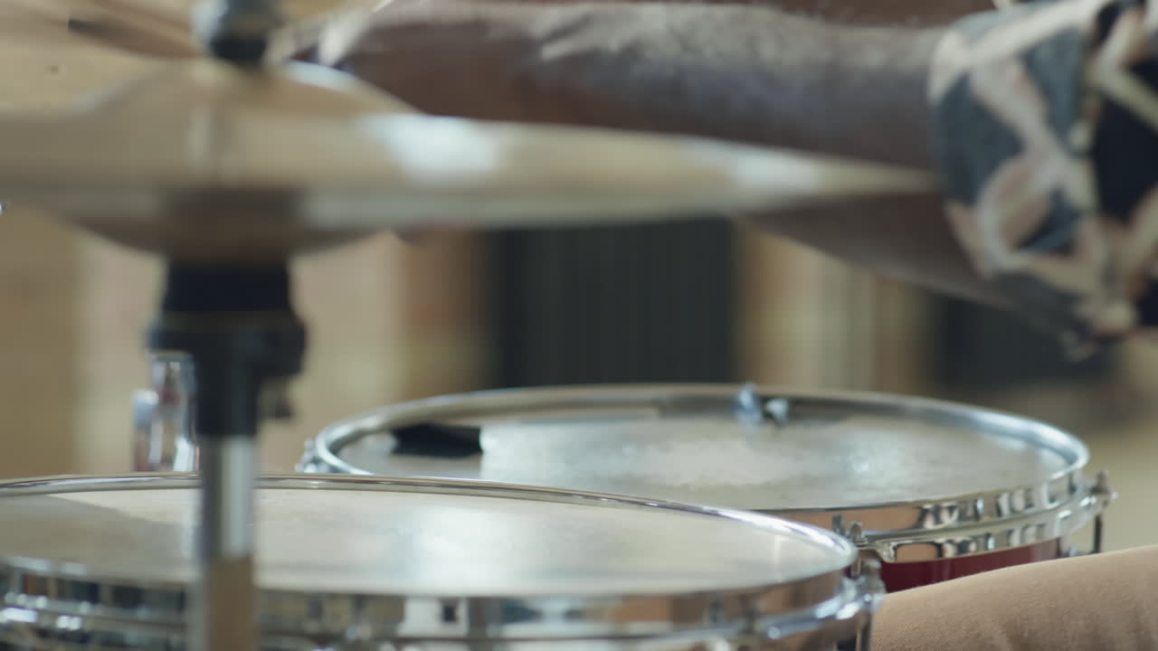 Close Up View of Professional Black Drummer Playing Drums