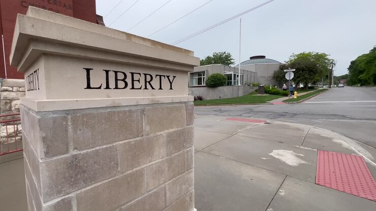 Road Marker to Liberty and Liberty Jail a Mormon Visitor Center Where Joseph Smith was held captive for Months in Liberty Missouri