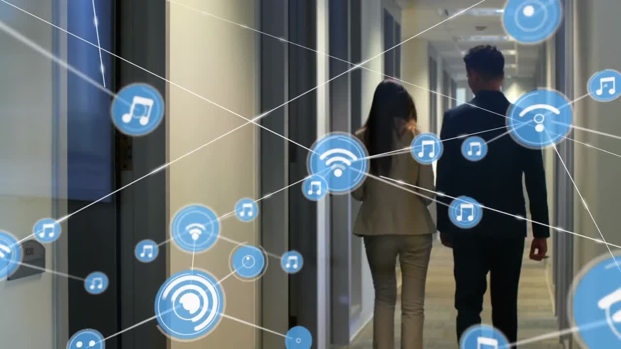Animation of network of connection with icons over diverse business people in office