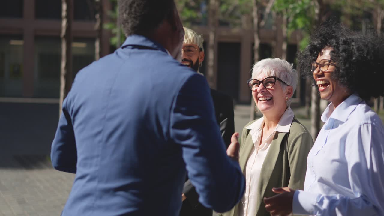 Happy business people meeting in the financial district