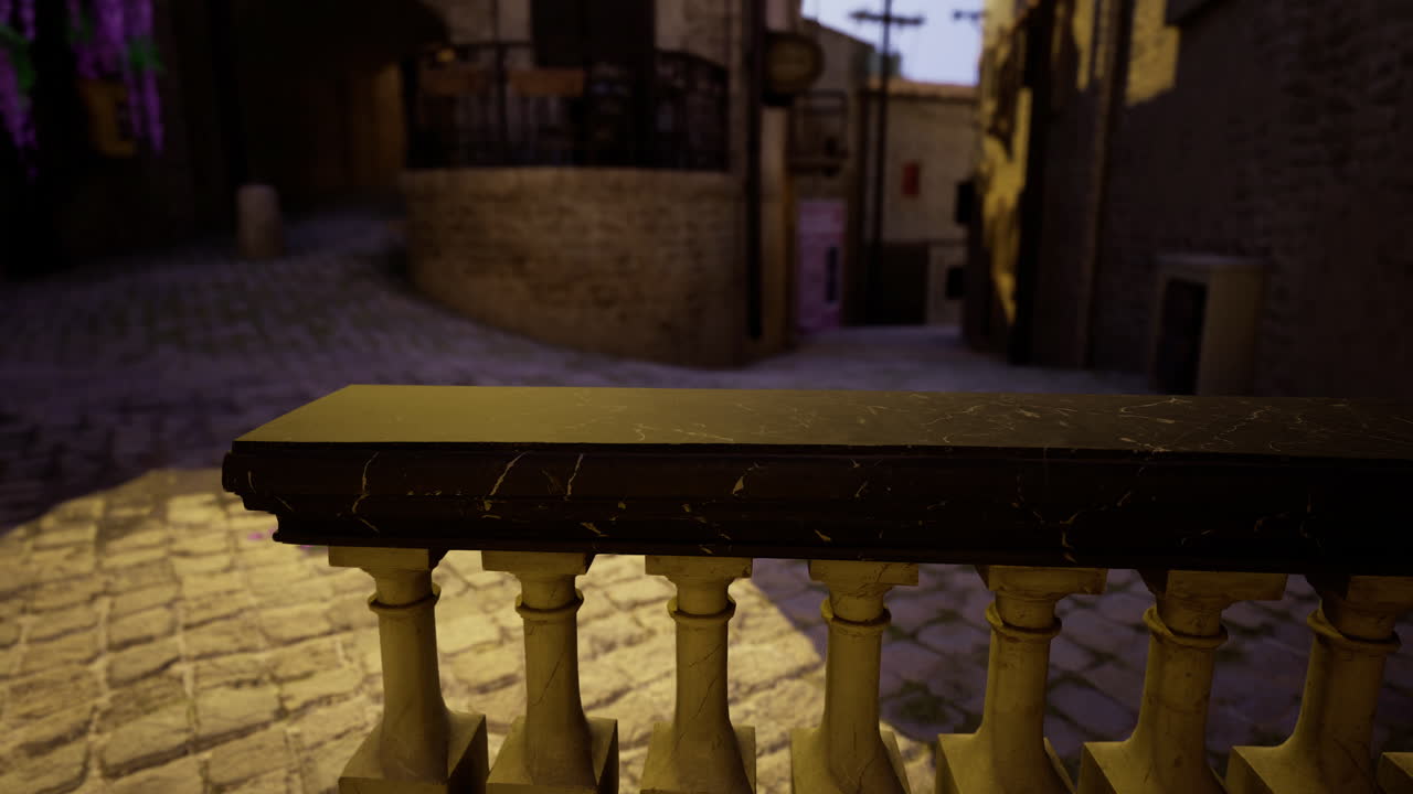 Stone railing overlooking a tranquil cobblestone street at dusk