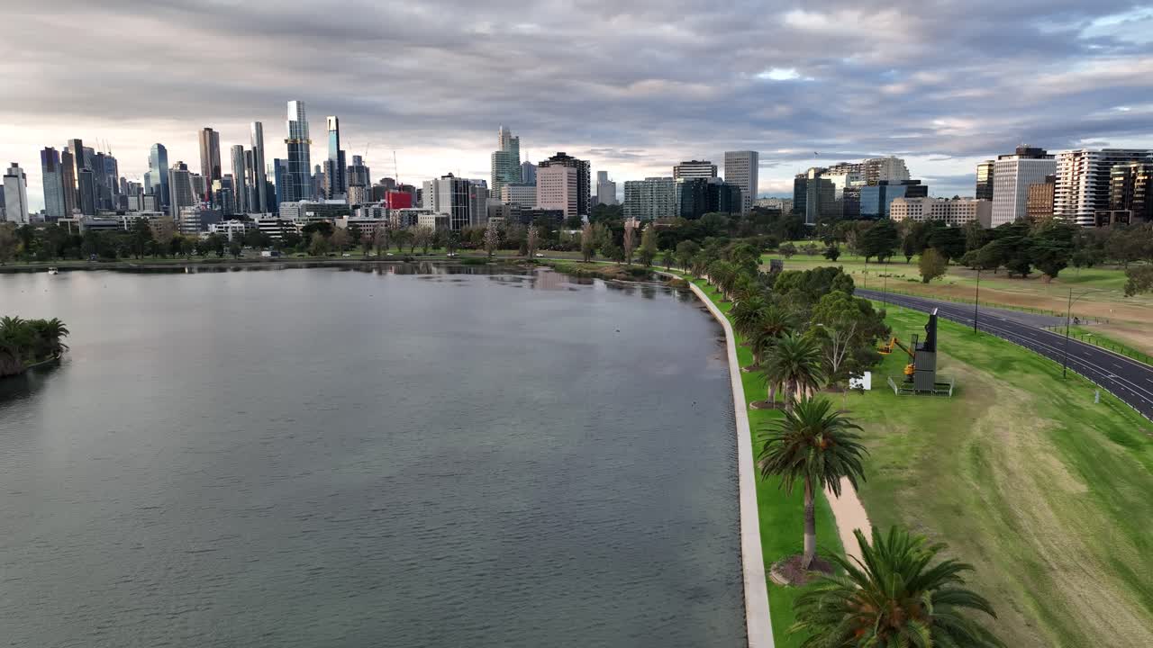 Aerial Drone View of Melbourne Skyline from Albert Park on a Cloudy Afternoon