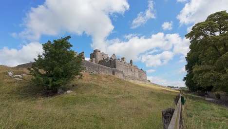 ireland epic locations view of the rock of cashel tipperary ireland from the trail to home abbey in the shadow of the rock