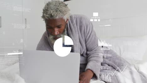 animation of financial data processing over senior african american man using laptop