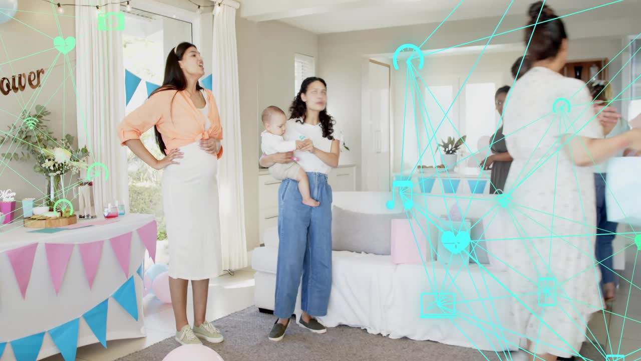 Pregnant mom talking and mom holding baby as guests picking plates at shower teal overlay streaming