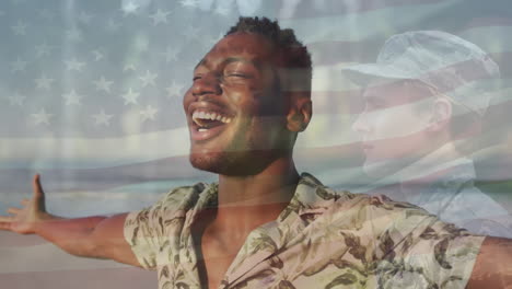 animation of flag of united states of america over soldier and african american man on beach