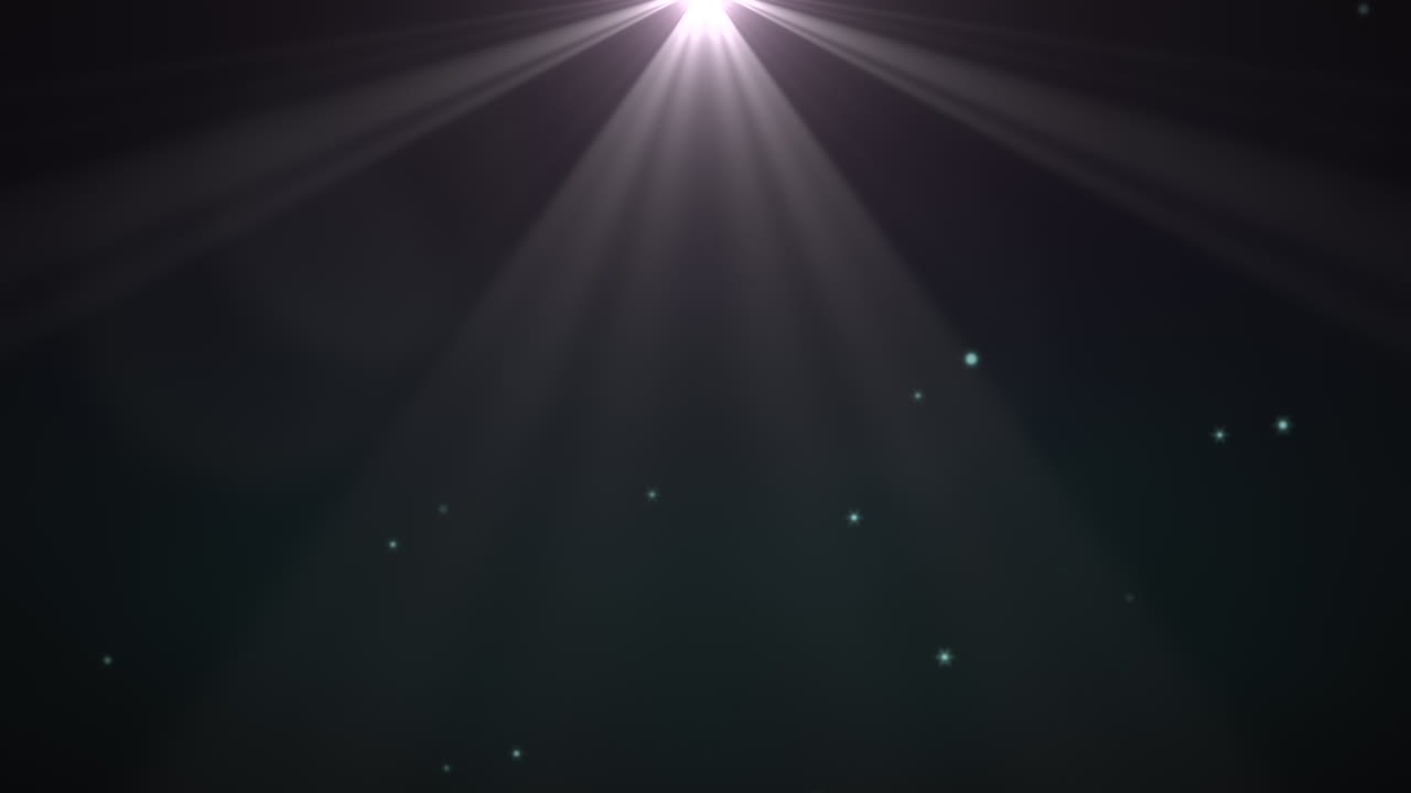 Motion beams and fly abstract particles with round bokeh on dark background