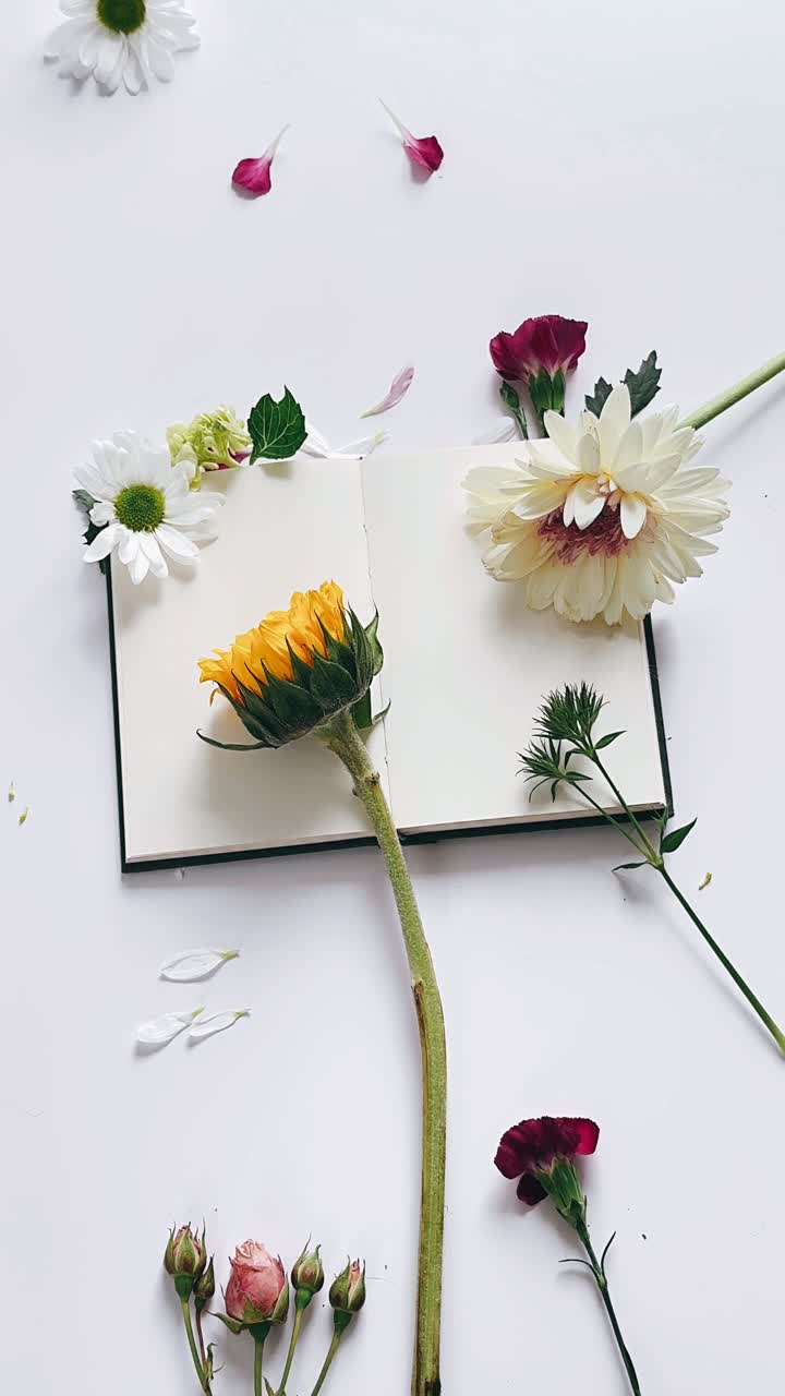 Floral Arrangement on a Blank Book