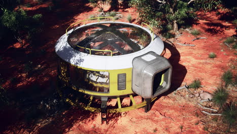 futuristic spaceship habitat in a desert landscape