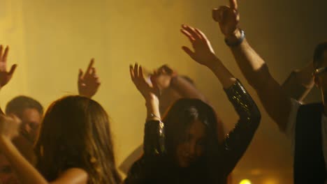 ecstatic crowd dancing together