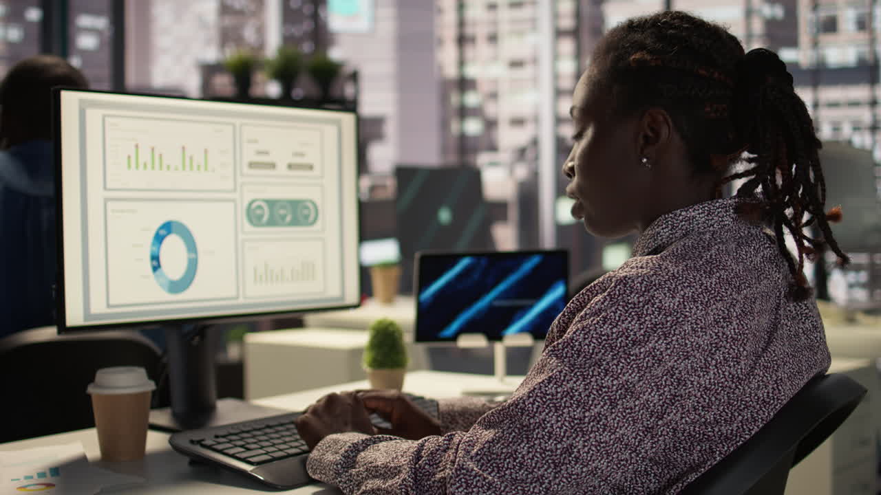 Business woman working at a computer in a modern office