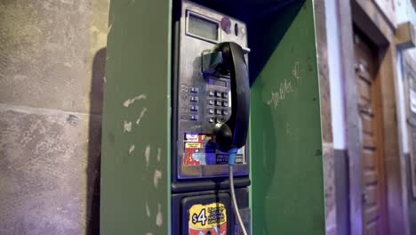 old tech payphone box in town