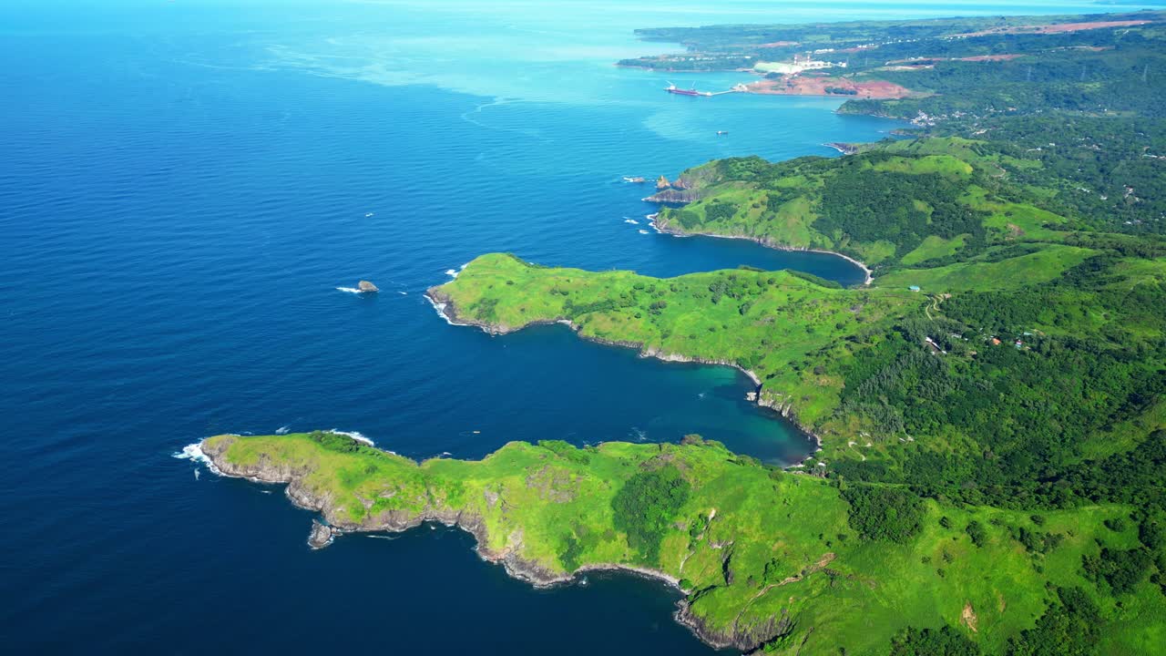 Overhead aerial of the Mariveles Five Fingers in Bataan, capturing lush green peninsulas jutting into the deep blue sea with rugged cliffs and intricate coastline formations
