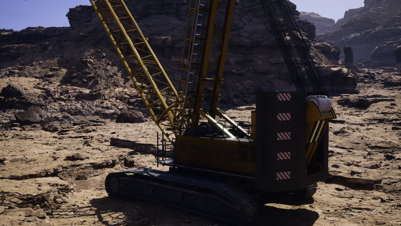Construction crane operating in a rocky landscape during daylight hours