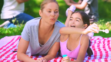 Young-couple-having-fun-with-their-children