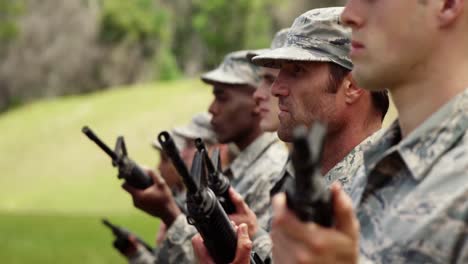 group of military soldiers standing with rifles 4k