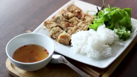 delicious vietnamese dish with noodles and greens