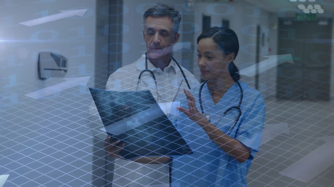 Dr and nurse stopping in hospital, reviewing chart for care, pointing, grid appearing across scene