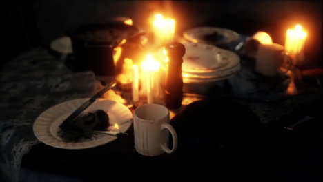 table setting in candlelight at night